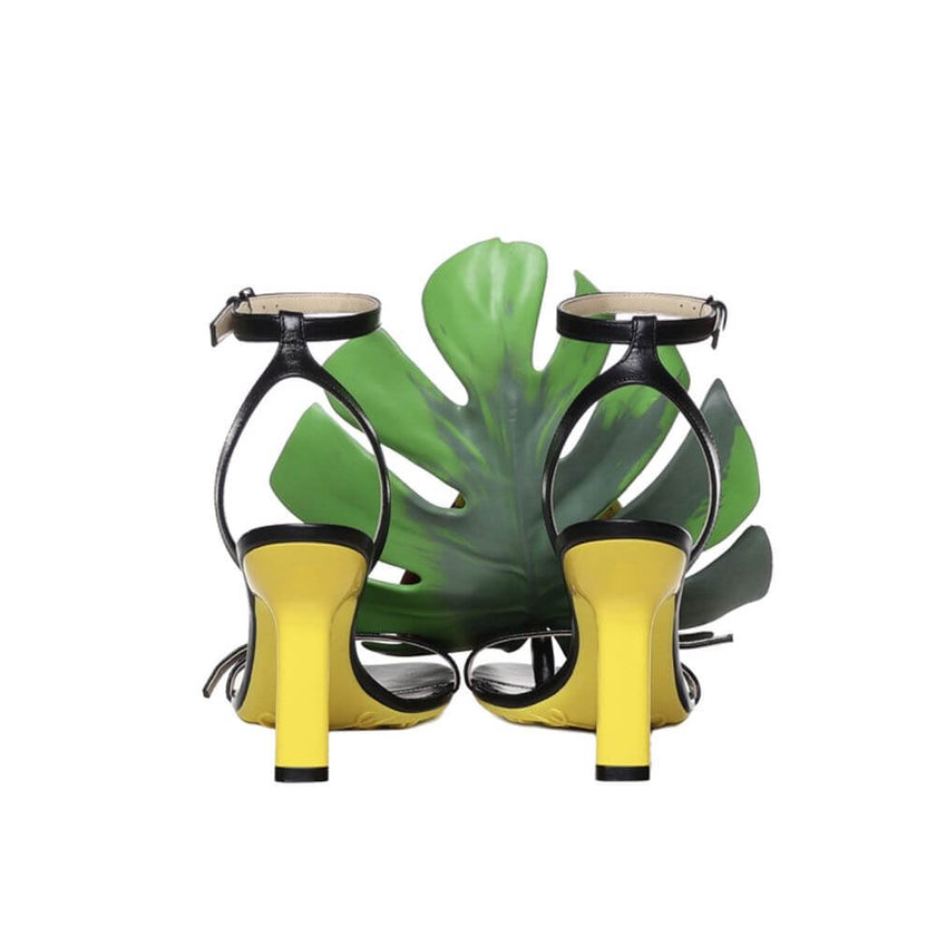 Black Lamb Leather Stiletto Heel SandalsDescription: – Composition: 100% Lamb Leather – Inner: 100% Leather – Insole: 100% Leather – Heel: 3.0 cm / 7.62 in – Round toe – Ankle side buckle fastening – Heel 9 cm – Monstera leaf and anthurium flower made of