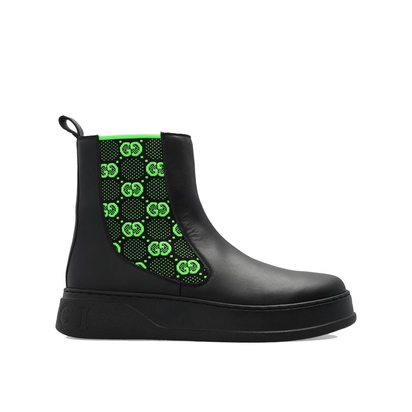 Black Leather Chelsea BootsDescription: – Composition: 100% Leather – Inner: 100% Leather – Insole: 100% Leather – Sole: 100% Rubber – pull tab at the rear – Round toe – elastic inserts for a slip-on design – high-top design – Embroidered monogram pattern