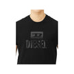 Black Cotton T-ShirtDiesel T-shirt jersey in black cotton tone on tone with logo print on the frontBlack Cotton T-Shirt${tagsDieselAulae Black Cotton T-Shirt DieselAulae Black Cotton T-Shirt Diesel T-shirt jersey in black cotton tone on tone with logo pri