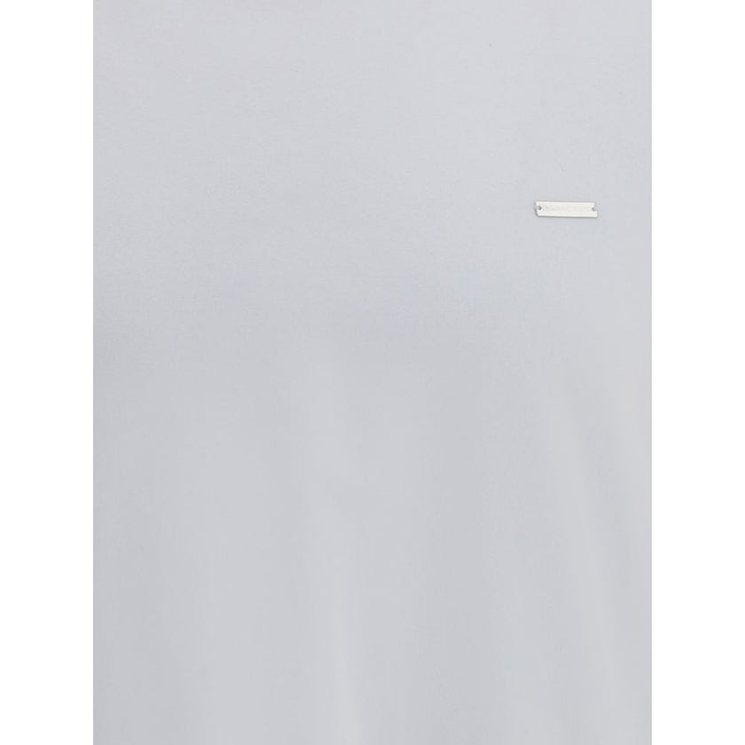 White Cotton T-ShirtDsquared2’s cotton T-Shirt is an essential garment with an urban, contemporary style. Made from soft cotton, it features a ribbed crew neck for comfort and durability. Printed on the front is the brand’s iconic contrasting monogram, a