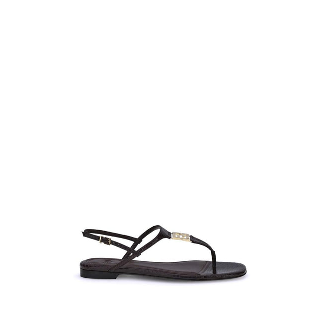 Purple Calf Leather Bos Taurus Flat SandalsFendi’s FFold Sandals are elegant square-toed flip-flops, embellished with a T-bar strap and an adjustable ankle strap. Crafted from dark purple ayers leather, they feature a metal FF detail and a leather insole,