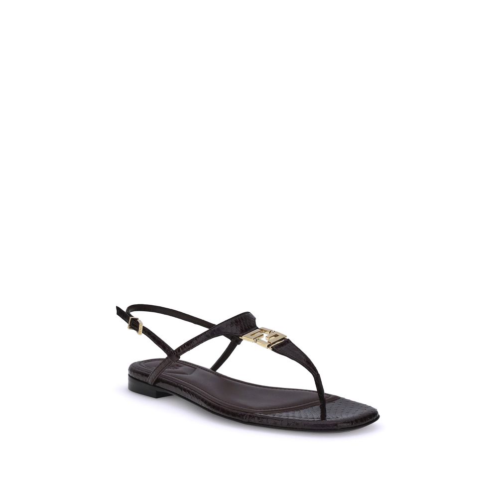 Purple Calf Leather Bos Taurus Flat SandalsFendi’s FFold Sandals are elegant square-toed flip-flops, embellished with a T-bar strap and an adjustable ankle strap. Crafted from dark purple ayers leather, they feature a metal FF detail and a leather insole,