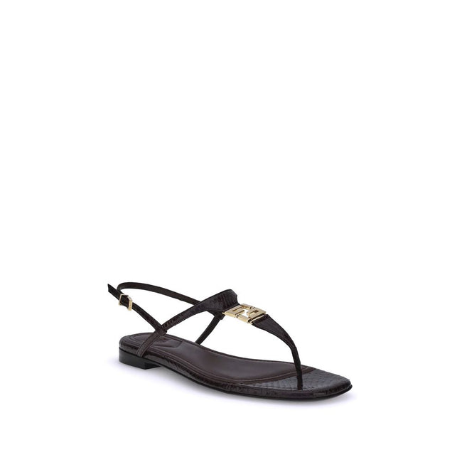 Purple Calf Leather Bos Taurus Flat SandalsFendi’s FFold Sandals are elegant square-toed flip-flops, embellished with a T-bar strap and an adjustable ankle strap. Crafted from dark purple ayers leather, they feature a metal FF detail and a leather insole,