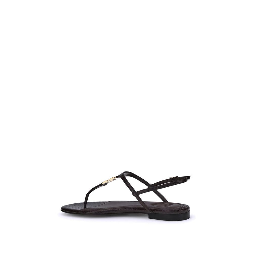 Purple Calf Leather Bos Taurus Flat SandalsFendi’s FFold Sandals are elegant square-toed flip-flops, embellished with a T-bar strap and an adjustable ankle strap. Crafted from dark purple ayers leather, they feature a metal FF detail and a leather insole,