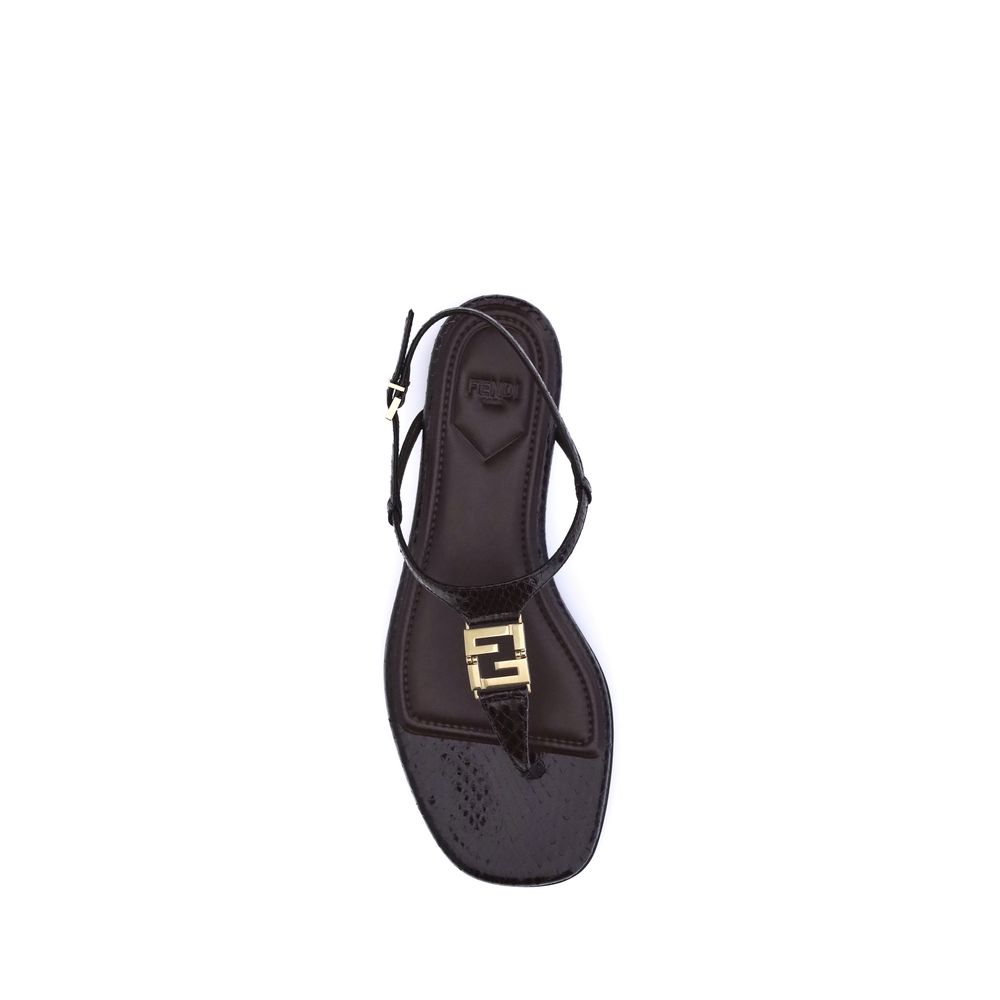 Purple Calf Leather Bos Taurus Flat SandalsFendi’s FFold Sandals are elegant square-toed flip-flops, embellished with a T-bar strap and an adjustable ankle strap. Crafted from dark purple ayers leather, they feature a metal FF detail and a leather insole,