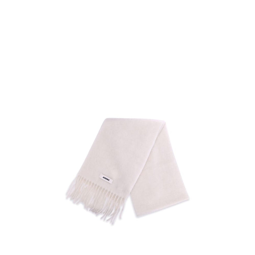 Fringed ScarfThe Jacquemus fringed Scarf is a long accessory crafted from soft mohair-alpaca. The grosgrain embroidered logo detail adds a refined touch to a warm and enveloping design. Season: AW25 Dimension: 250×250 Composition: GENERAL 28% Mohair 28% A