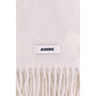 Fringed ScarfThe Jacquemus fringed Scarf is a long accessory crafted from soft mohair-alpaca. The grosgrain embroidered logo detail adds a refined touch to a warm and enveloping design. Season: AW25 Dimension: 250×250 Composition: GENERAL 28% Mohair 28% A