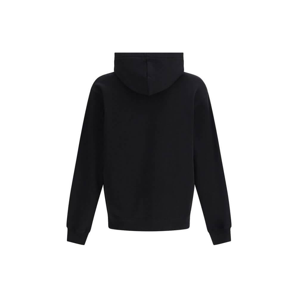 Black Cotton SweatshirtJacquemus’ Hooded Sweatshirt, made of soft cotton with a plush interior, offers snug comfort that is ideal for everyday wear. The clean design is embellished with an applied logo patch on the front, adding a distinctive and recogniz