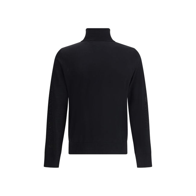 Black Fleece Wool TurtleneckVirgin wool turtleneck Sweater by Dsquared2 features a soft high collar that can be turned up as desired. Ribbed cuffs and hem ensure a snug and comfortable fit. The front is embellished with the iconic tone-on-tone embroidered