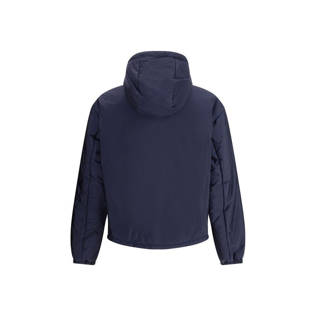 Blue Polyester Full-Length JacketNylon jacket with an all-over quilted design by Prada, perfect for tackling mid-season in style. Featuring an adjustable drawstring hood and front zipper closure, it has two handy side welt pockets and elastic cuffs for a