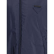 Blue Polyester Full-Length JacketNylon jacket with an all-over quilted design by Prada, perfect for tackling mid-season in style. Featuring an adjustable drawstring hood and front zipper closure, it has two handy side welt pockets and elastic cuffs for a