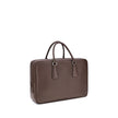 Brown Calf Leather Bos Taurus BriefcasePrada’s Men’s Handbag is an elegant and functional accessory designed to accompany everyday life in style. Equipped with two round handles and a top zipper closure, it features the iconic triangular plaque applied on