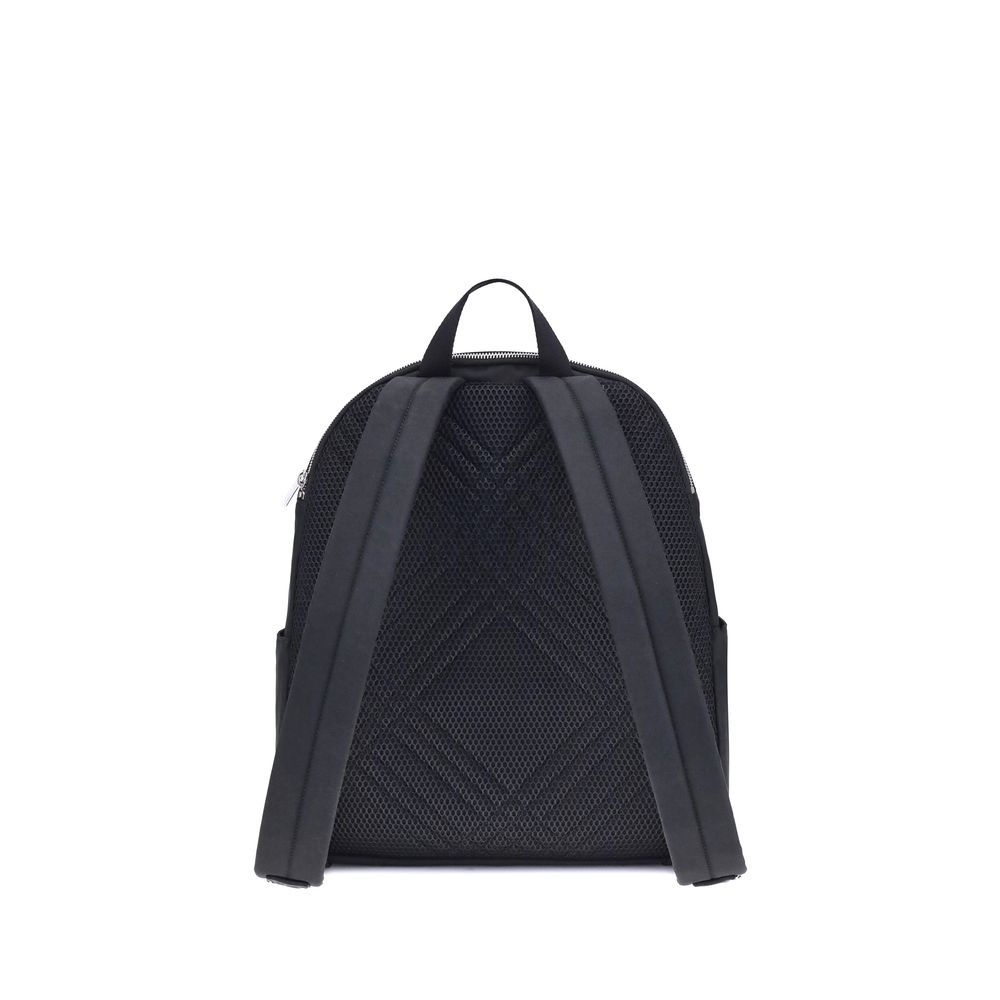 Black Polyamide BackpackBurberry’s Orkney Backpack combines functionality with distinctive design. The mesh back panel features a delicate Check pattern, while the exterior zippered panel offers secure laptop storage space. Complete with a top handle and