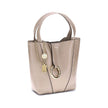 Beige Calf Leather Bos Taurus Shoulder BagThe Spin Shoulder Bag by Chloé, crafted by shiny grained leather, features an elegant design with two flat top handles and an adjustable shoulder strap. The closure is secured by a magnetic button, while the detai