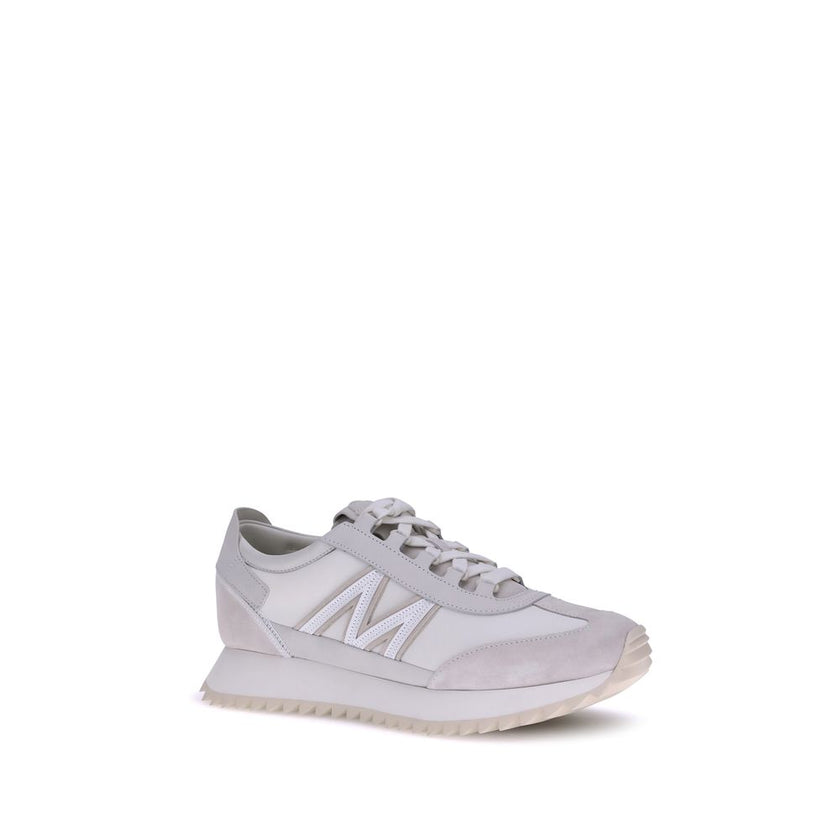 White Polyamide Low Top SneakersMoncler’s Pacey2 Sneakers are lightweight and flexible, perfect as a city sneaker for casual and sophisticated style. The low-top model combines nylon, suede and nubuck leather uppers, offering a mix of high-quality materia
