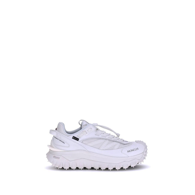 White Polyamide Athletic SneakersMoncler’s Trailgrip GTX Sneakers combine technical performance and urban style in a design designed to tackle any terrain. Made with nylon, Tectuff and leather uppers, they feature a mesh lining with a waterproof GORE-TEX