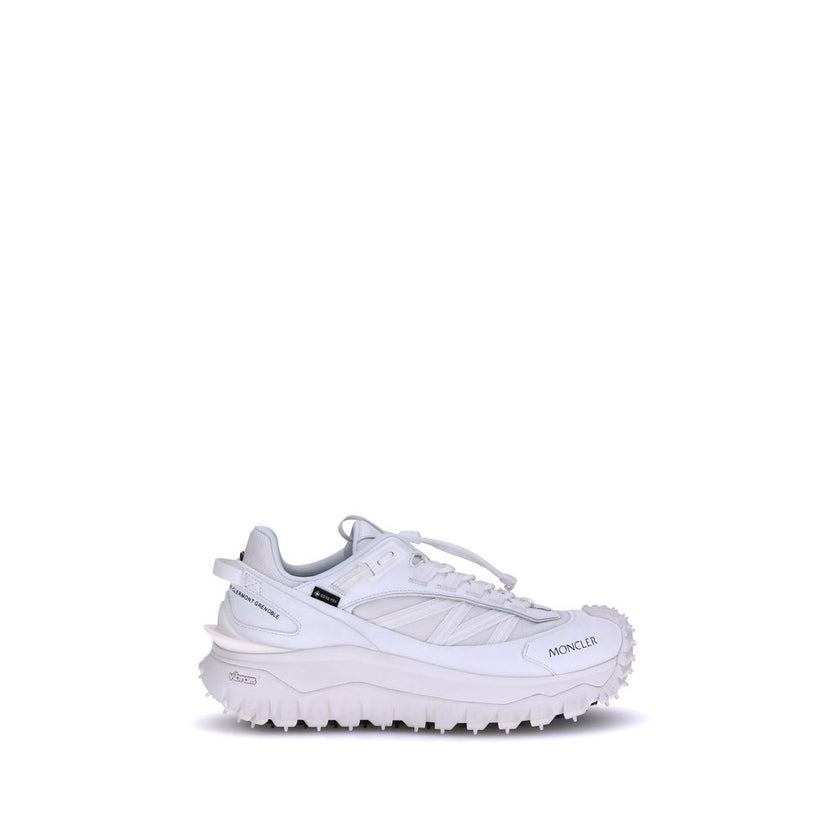 White Polyamide Athletic SneakersMoncler’s Trailgrip GTX Sneakers combine technical performance and urban style in a design designed to tackle any terrain. Made with nylon, Tectuff and leather uppers, they feature a mesh lining with a waterproof GORE-TEX