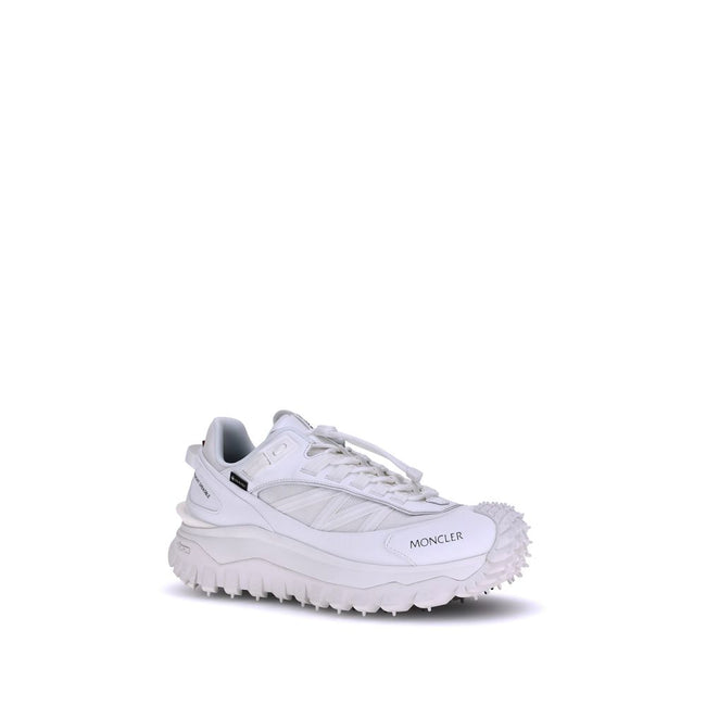 White Polyamide Athletic SneakersMoncler’s Trailgrip GTX Sneakers combine technical performance and urban style in a design designed to tackle any terrain. Made with nylon, Tectuff and leather uppers, they feature a mesh lining with a waterproof GORE-TEX