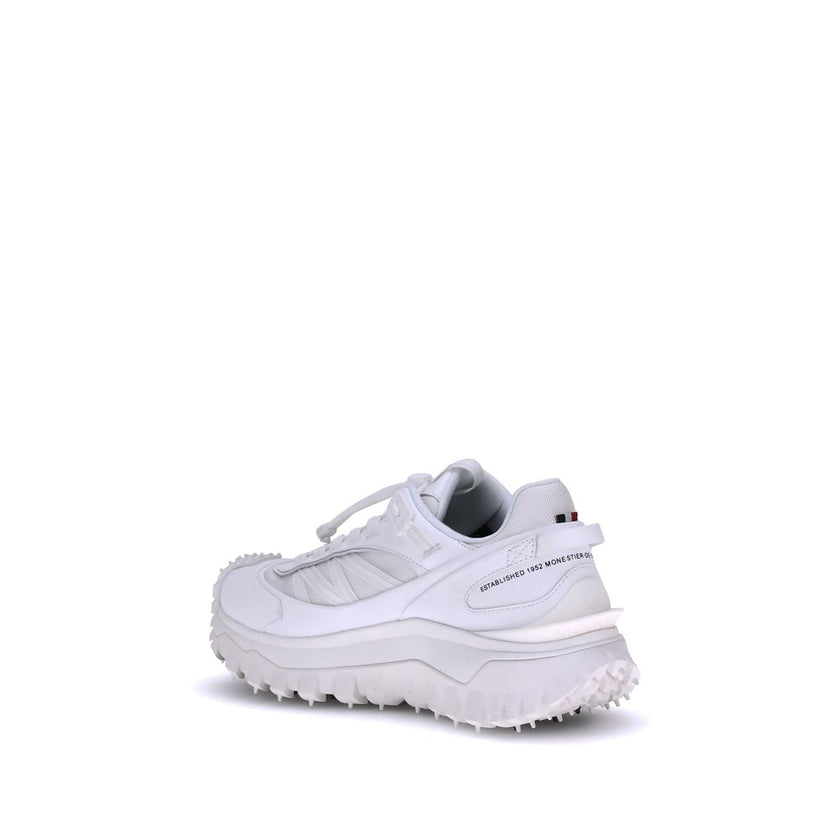 White Polyamide Athletic SneakersMoncler’s Trailgrip GTX Sneakers combine technical performance and urban style in a design designed to tackle any terrain. Made with nylon, Tectuff and leather uppers, they feature a mesh lining with a waterproof GORE-TEX