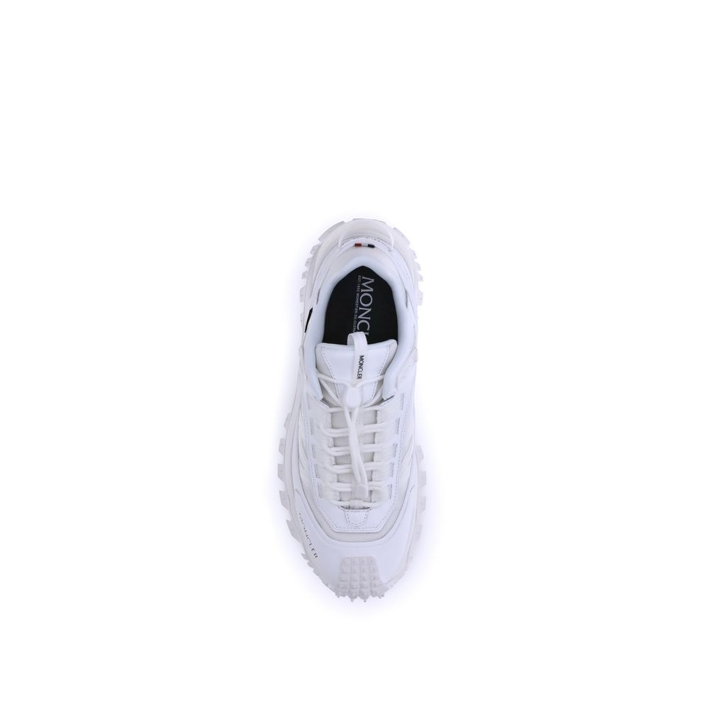 White Polyamide Athletic SneakersMoncler’s Trailgrip GTX Sneakers combine technical performance and urban style in a design designed to tackle any terrain. Made with nylon, Tectuff and leather uppers, they feature a mesh lining with a waterproof GORE-TEX