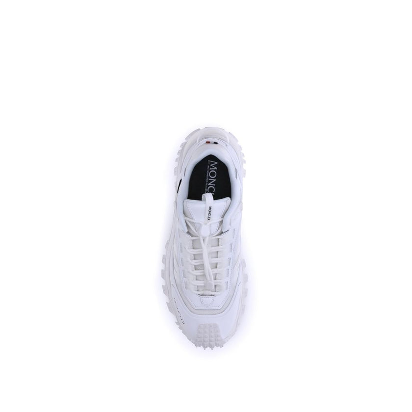 White Polyamide Athletic SneakersMoncler’s Trailgrip GTX Sneakers combine technical performance and urban style in a design designed to tackle any terrain. Made with nylon, Tectuff and leather uppers, they feature a mesh lining with a waterproof GORE-TEX