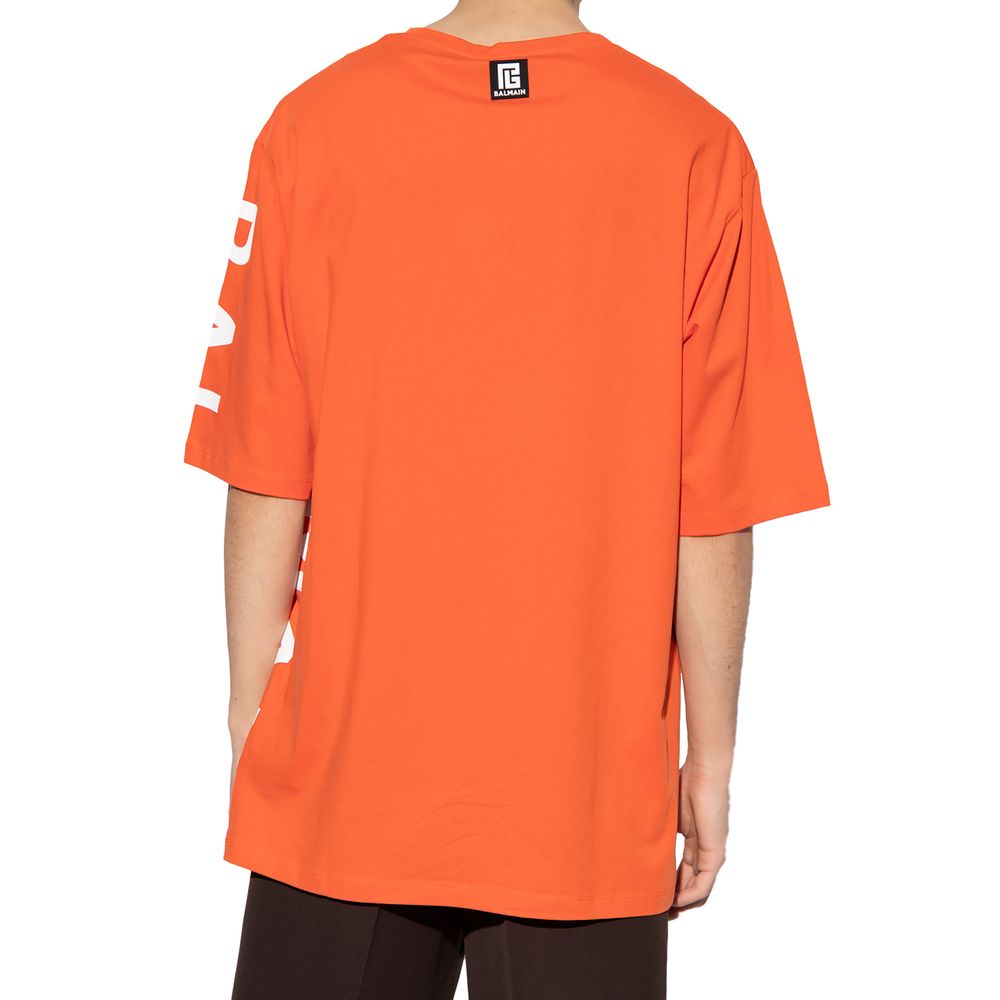 Orange Cotton T-ShirtBalmain cotton t-shirt with short sleeves and logo print on the side and rubber logo on the backOrange Cotton T-Shirt${tagsBalmainAulae Orange Cotton T-Shirt BalmainAulae Orange Cotton T-Shirt Balmain cotton t-shirt with short sleeves