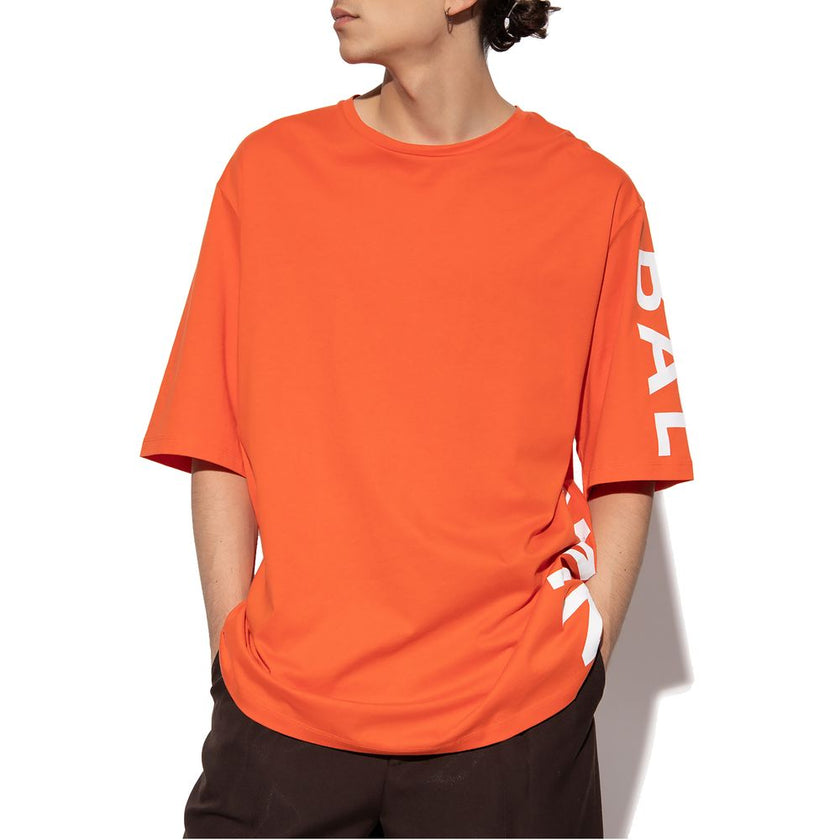 Orange Cotton T-ShirtBalmain cotton t-shirt with short sleeves and logo print on the side and rubber logo on the backOrange Cotton T-Shirt${tagsBalmainAulae Orange Cotton T-Shirt BalmainAulae Orange Cotton T-Shirt Balmain cotton t-shirt with short sleeves