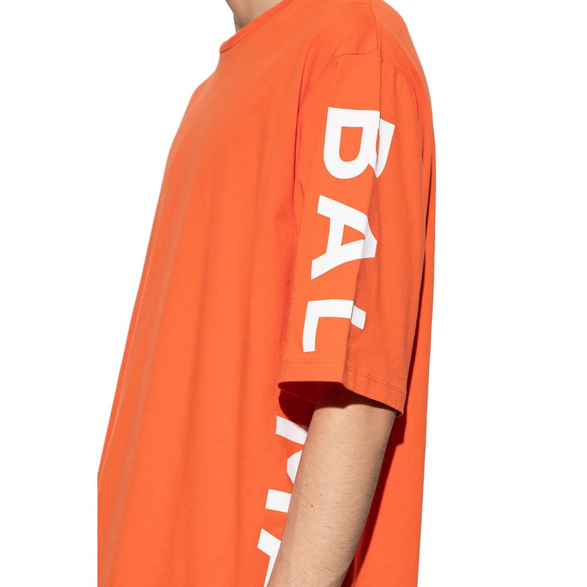 Orange Cotton T-ShirtBalmain cotton t-shirt with short sleeves and logo print on the side and rubber logo on the backOrange Cotton T-Shirt${tagsBalmainAulae Orange Cotton T-Shirt BalmainAulae Orange Cotton T-Shirt Balmain cotton t-shirt with short sleeves