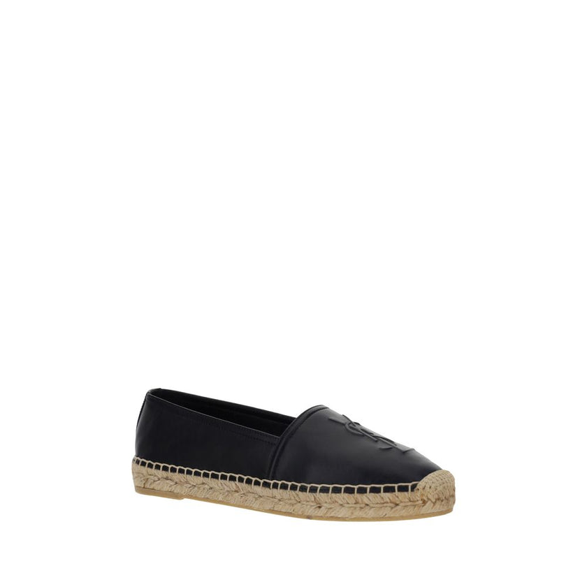 Black Lamb Ovis Aries Aries EspadrillesLambskin Espadrilles by Saint Laurent, flat sole with rope detail, elongated toe, slip-on style, iconic brand monogram tone-on-tone press-stamped on front, contrasting logo insole. Season: AW25 Composition: UPPER 100