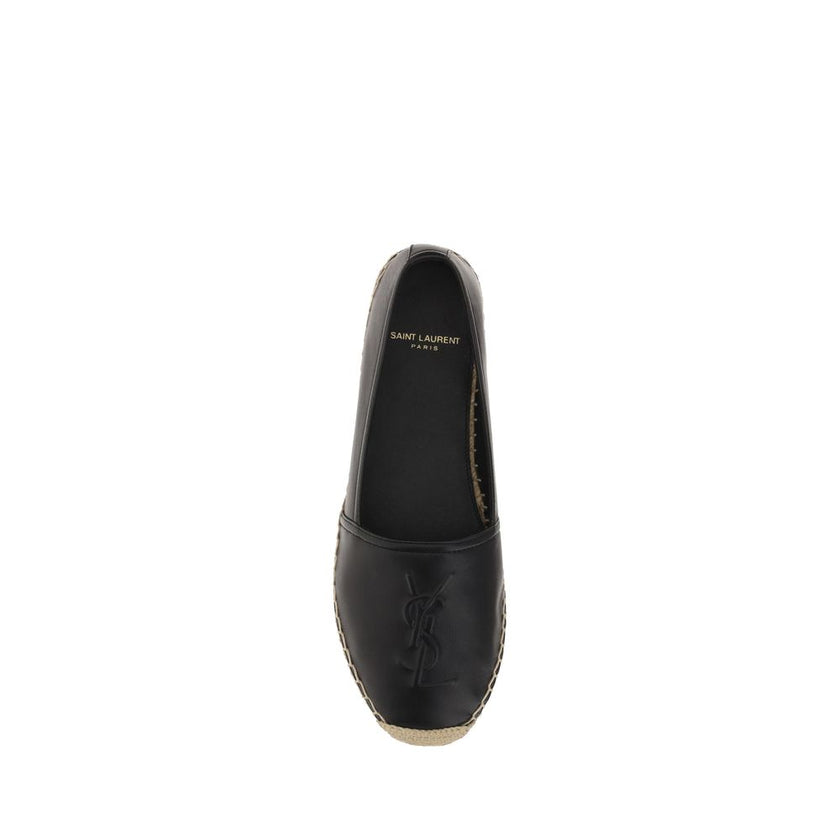 Black Lamb Ovis Aries Aries EspadrillesLambskin Espadrilles by Saint Laurent, flat sole with rope detail, elongated toe, slip-on style, iconic brand monogram tone-on-tone press-stamped on front, contrasting logo insole. Season: AW25 Composition: UPPER 100