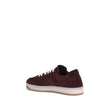 Bordeaux Calf Leather Bos Taurus Low Top SneakersPrada’s suede sneakers are a model that combines discreet elegance and comfort. The soft suede leather gives a sophisticated texture, perfect for a casual yet refined look. The lace-up top closure ensures a