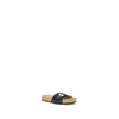 Black Calf Leather Bos Taurus Flat SandalsThe Scholl Flat Sandals by Balenciaga, made of calfskin leather, are the result of a collaboration between the two brands and blend ergonomic comfort with contemporary style. The model, open at the front, features