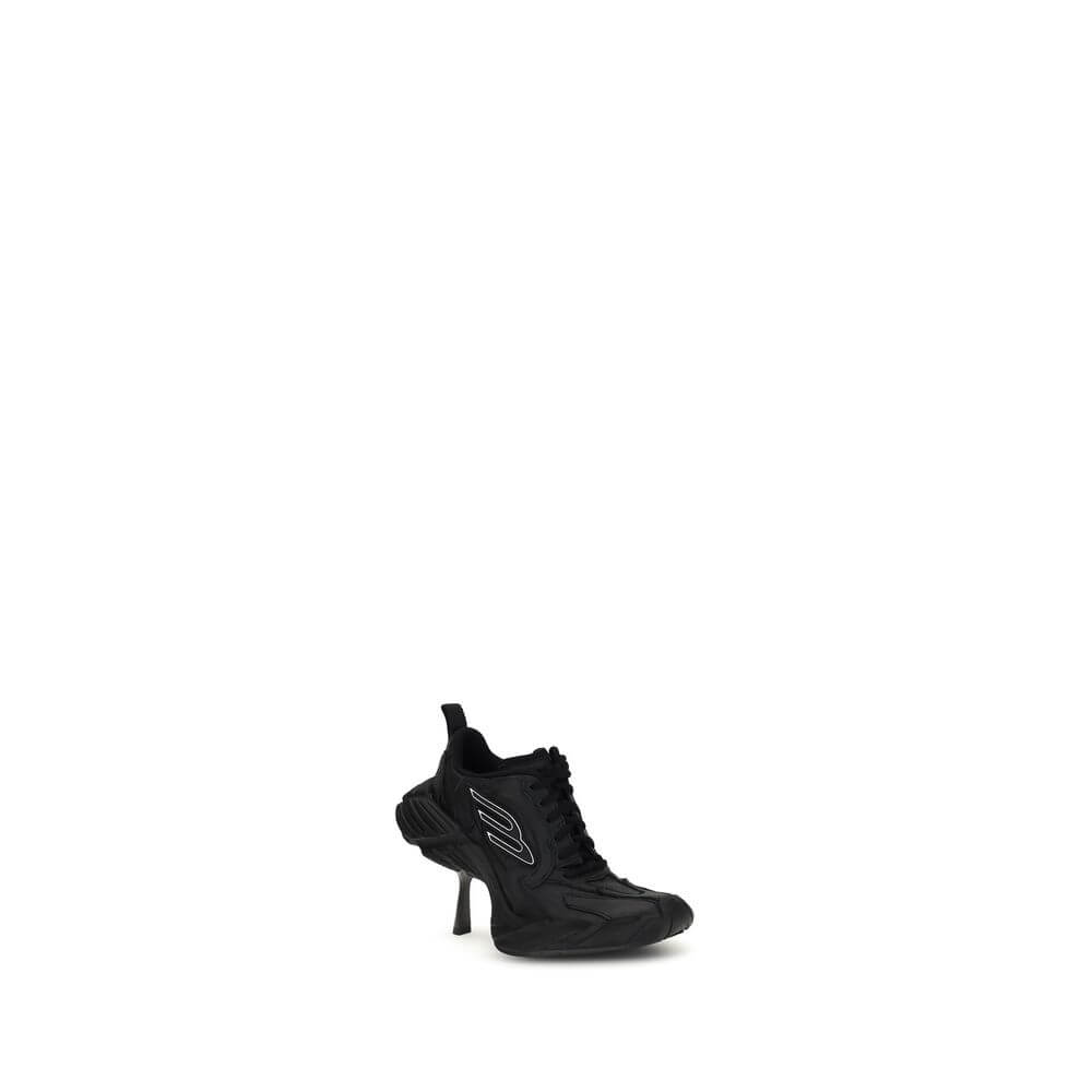 Monday Heel SneakersBalenciaga’s Monday Heel Sneakers are made of cowhide leather and polyester, featuring a curvature that gives a distinctive, modern design. The worn effect and exposed topstitching enhance the model’s lived-in, handcrafted aesthetic. T