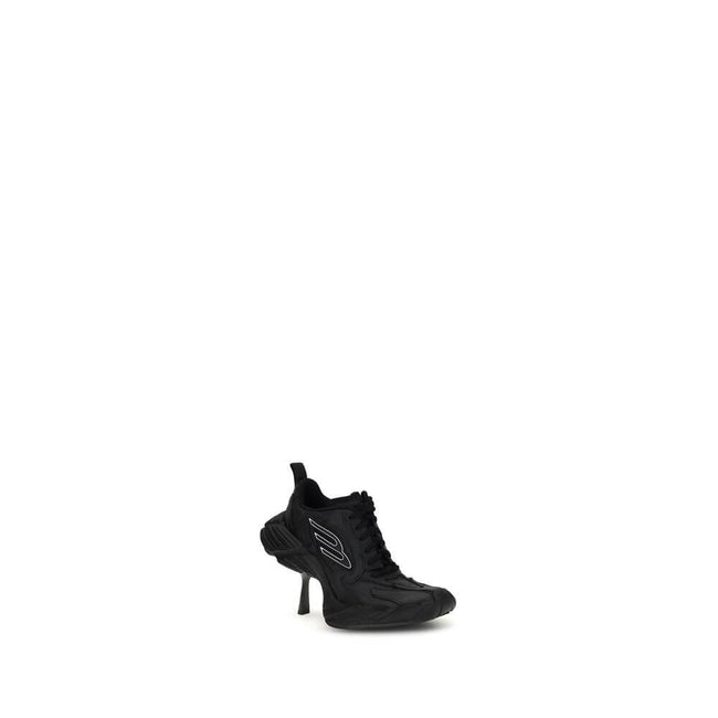 Monday Heel SneakersBalenciaga’s Monday Heel Sneakers are made of cowhide leather and polyester, featuring a curvature that gives a distinctive, modern design. The worn effect and exposed topstitching enhance the model’s lived-in, handcrafted aesthetic. T