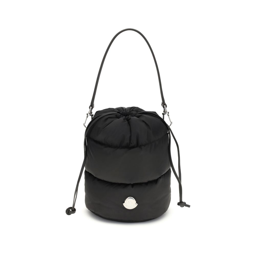 Black Polyester Backet BagMoncler’s Caradoc Bucket Bag is made of water-repellent nylon, with an inner lining of the same material for extra protection. Padded with down, it offers a practical drawstring closure. The leather shoulder strap is adjustable a