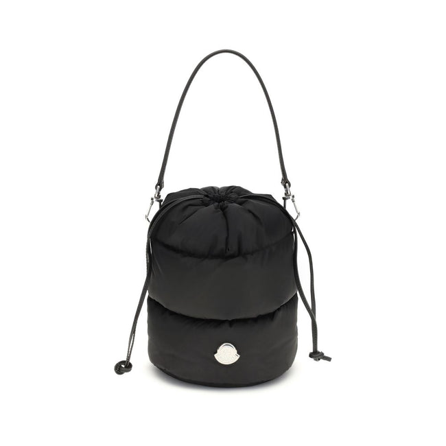 Black Polyester Backet BagMoncler’s Caradoc Bucket Bag is made of water-repellent nylon, with an inner lining of the same material for extra protection. Padded with down, it offers a practical drawstring closure. The leather shoulder strap is adjustable a