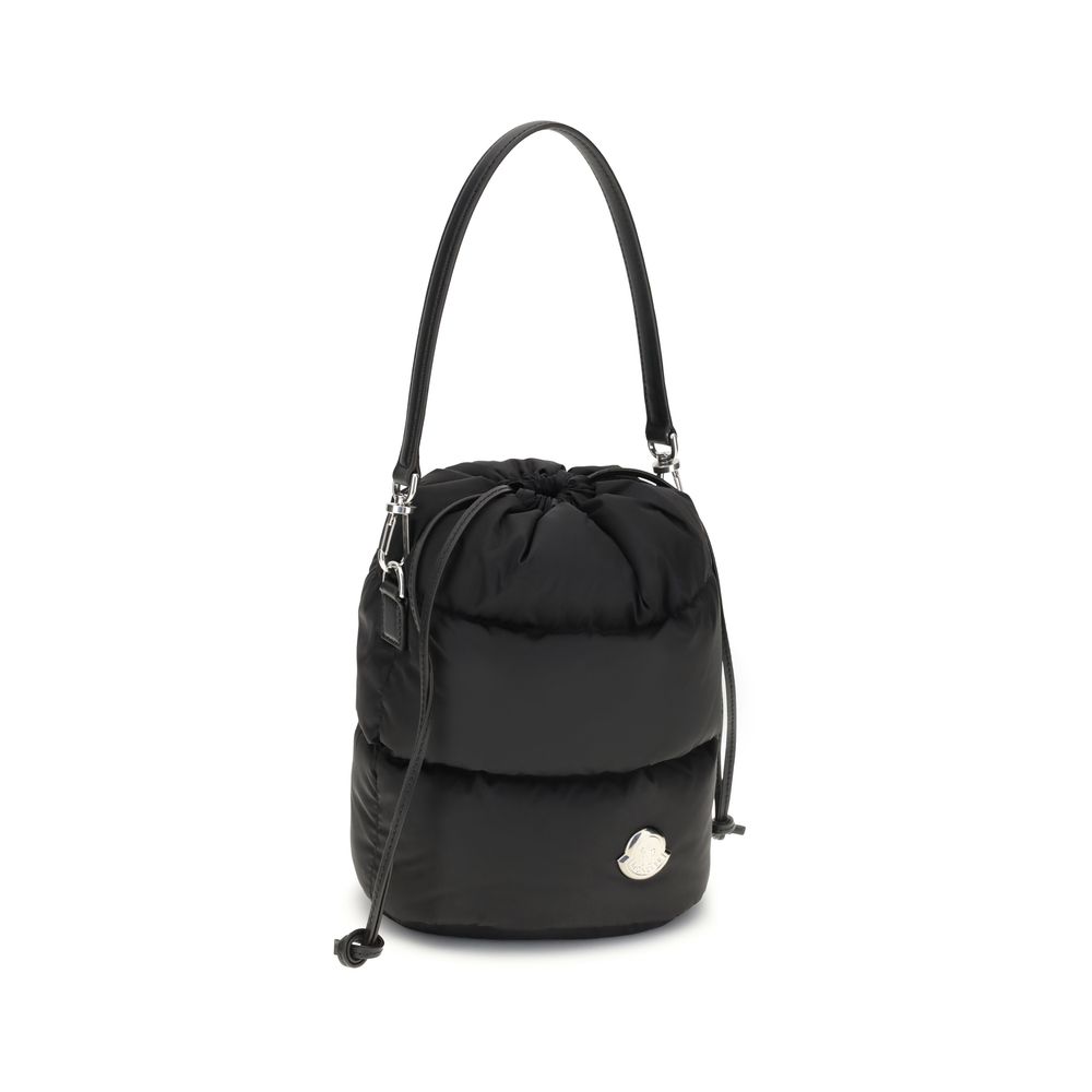 Black Polyester Backet BagMoncler’s Caradoc Bucket Bag is made of water-repellent nylon, with an inner lining of the same material for extra protection. Padded with down, it offers a practical drawstring closure. The leather shoulder strap is adjustable a