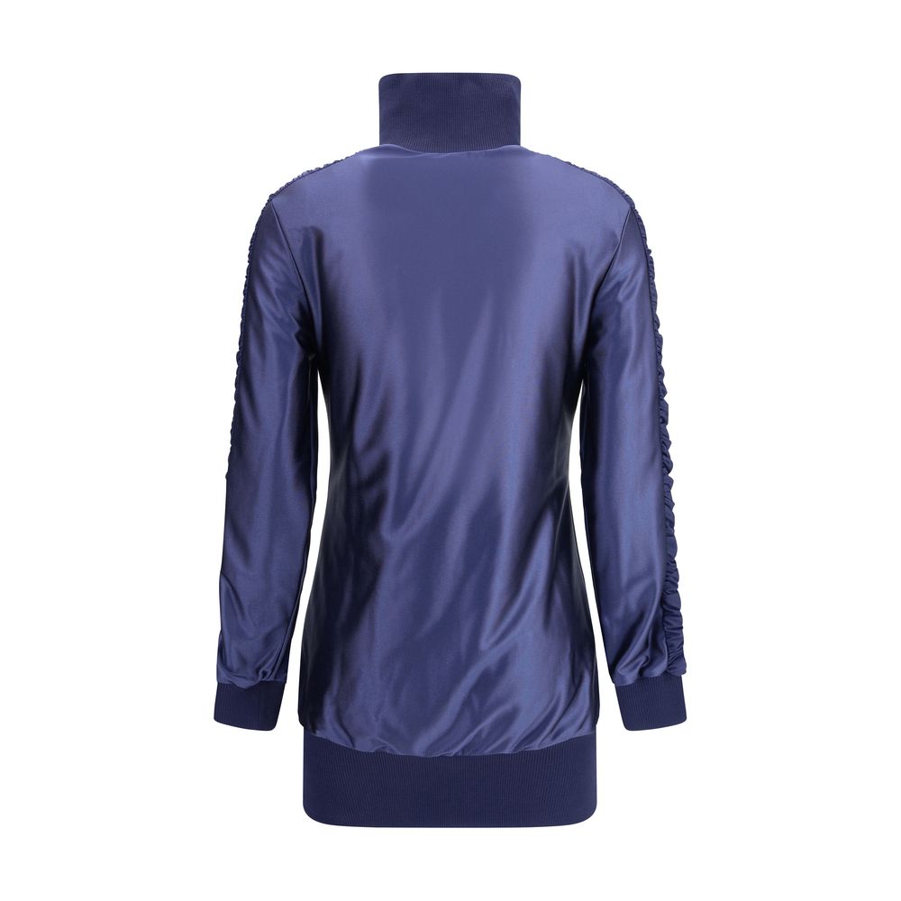 Blue Polyester SweatsuitBalenciaga’s shiny jersey fitted tracksuit Dress combines sportiness with refined style. Featuring a high collar and front zipper, it features a ruching band on the sleeves, two zippered pockets, gathers on the cuffs and waist, rib