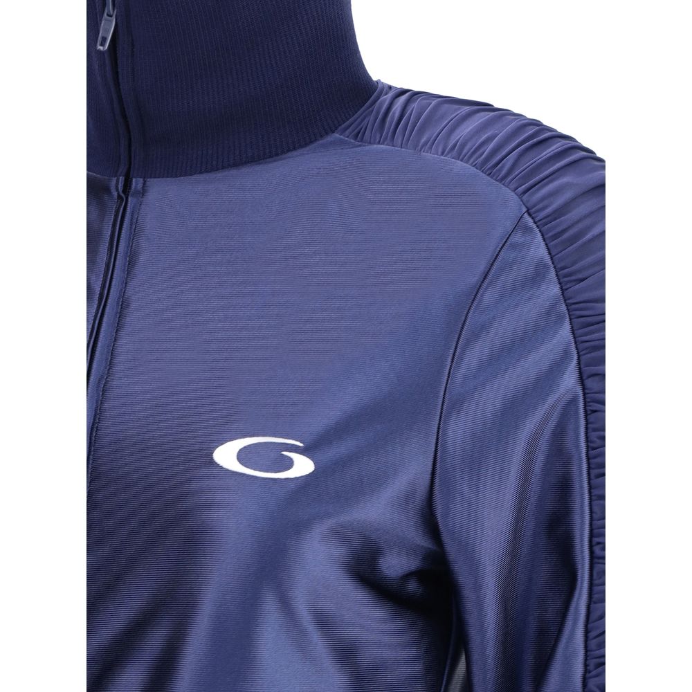 Blue Polyester SweatsuitBalenciaga’s shiny jersey fitted tracksuit Dress combines sportiness with refined style. Featuring a high collar and front zipper, it features a ruching band on the sleeves, two zippered pockets, gathers on the cuffs and waist, rib