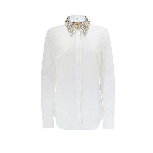 White Cotton Dress ShirtWhite Shirt with Removable Jewel Collar Gucci. Front fastening with covered buttons, long sleeves, removable classic collar covered with decorated tulle and crystals, Korean collar. Regular fit. Composition: 100% Cotton Internal SK