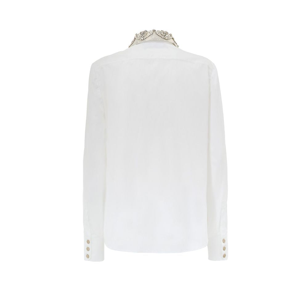 White Cotton Dress ShirtWhite Shirt with Removable Jewel Collar Gucci. Front fastening with covered buttons, long sleeves, removable classic collar covered with decorated tulle and crystals, Korean collar. Regular fit. Composition: 100% Cotton Internal SK