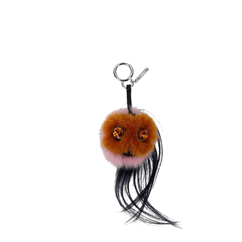 Brown Fur KeychainDescription: The product with MPN 7AR4664CNF01E0 and code F38168 fur in brown is a keychain designed by Fendi. It has features like rhinestone. Additional Info: Materials: Leather Measurements: 8×15 cm MPN: 7AR4664CNF01E0 New collection:
