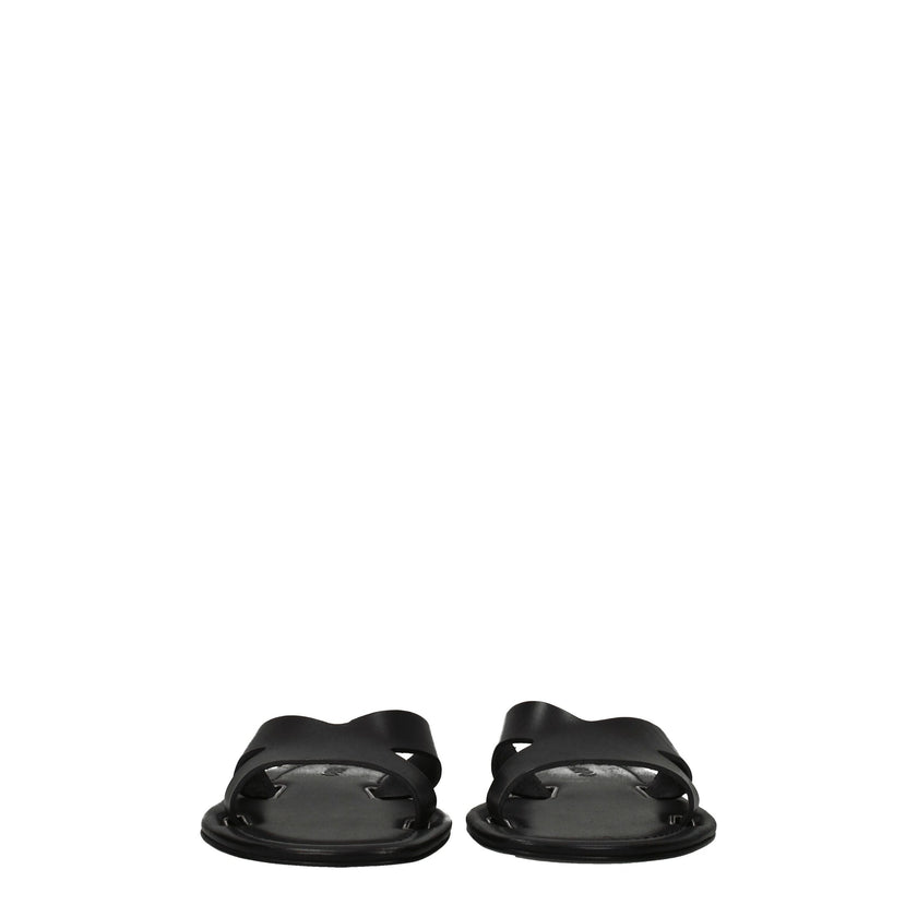 Black Leather SlippersDescription: The product with MPN FB52MU021L6599 and code F65450 leather in black is a slippers and clogs designed by Kenzo. Additional Info: Style: Casual Materials: Leather Shoe sole: Leather Shoe tip: Open toe Heel type: Low and f
