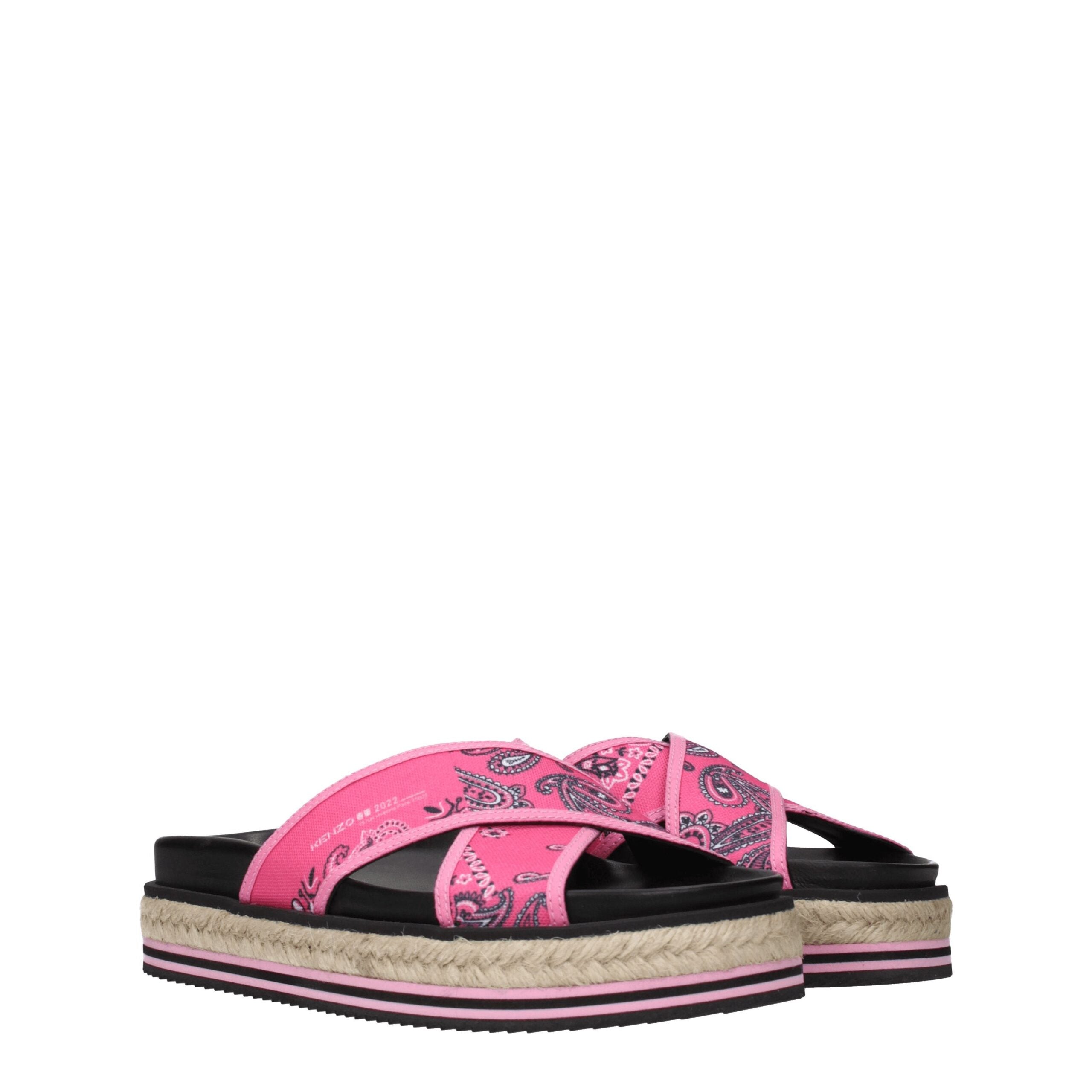 Pink Fabric SlippersDescription: The product with MPN FC52ES194F7427 and code F70128 fabric in fuchsia is a slippers and clogs designed by Kenzo. It has features like side logo. Additional Info: Style: Casual Materials: Fabric Shoe sole: Rubber Heel heigh