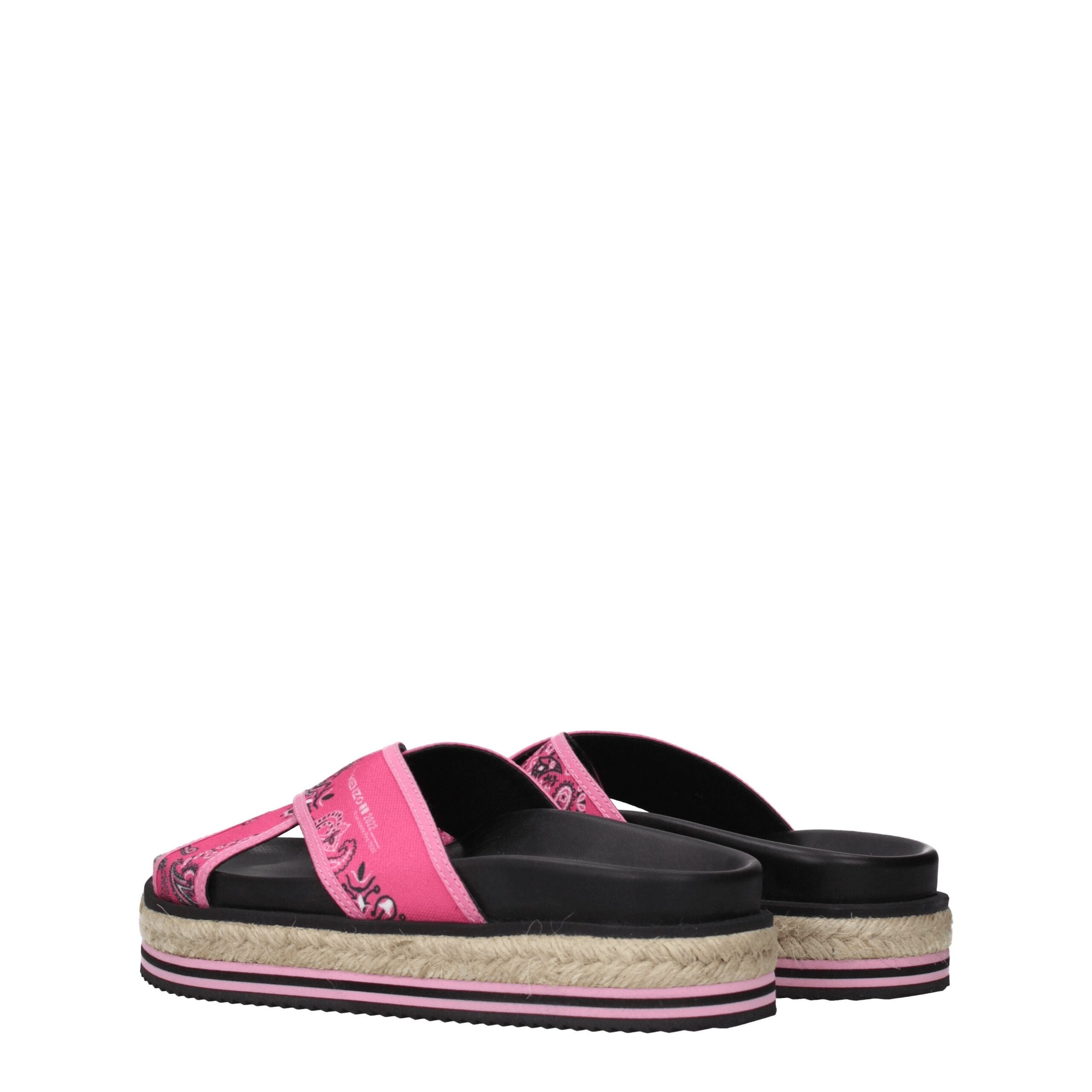 Pink Fabric SlippersDescription: The product with MPN FC52ES194F7427 and code F70128 fabric in fuchsia is a slippers and clogs designed by Kenzo. It has features like side logo. Additional Info: Style: Casual Materials: Fabric Shoe sole: Rubber Heel heigh