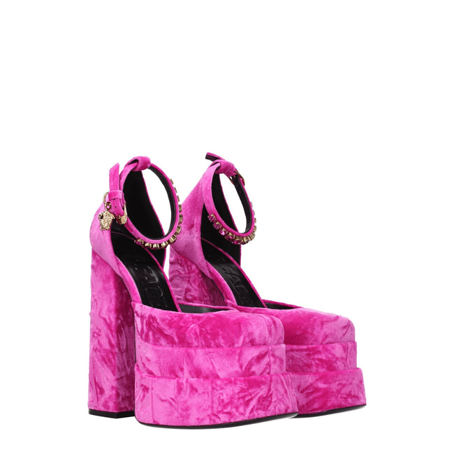 Pink Velvet Platform SandalsDescription: The product with MPN 10020051A064651PK3V and code F76163 velvet in fuchsia is a sandals designed by Versace. It has features like front detail, rhinestone. Additional Info: Color details: Gold Style: Casual Closing
