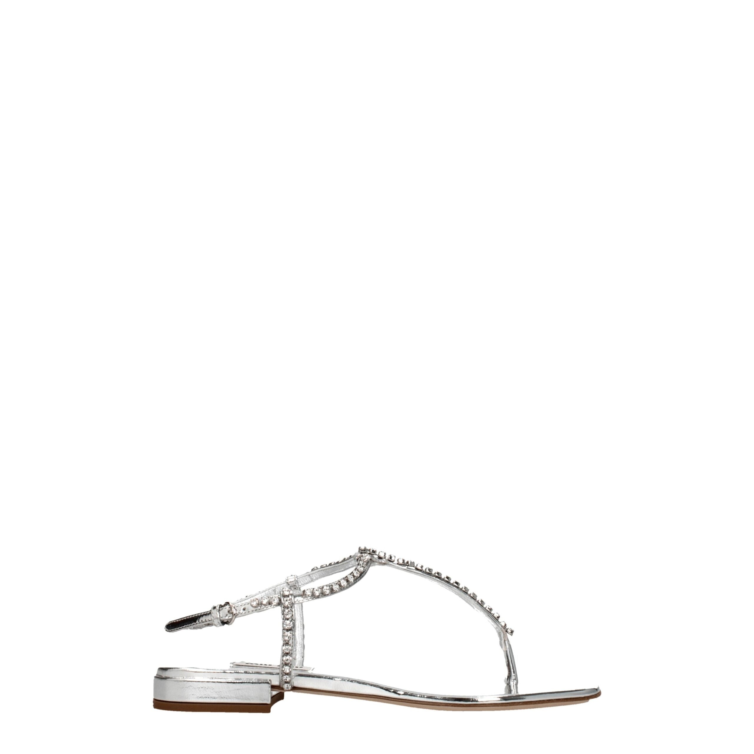 Gray Leather Flip-Flop SandalsDescription: The product with MPN 5Y920D3L1N010F0118 and code F76545 leather in silver is a flip flops designed by Miu Miu. It has features like metallic effect, rhinestone. Additional Info: Style: Stylish Closing type: Buckl