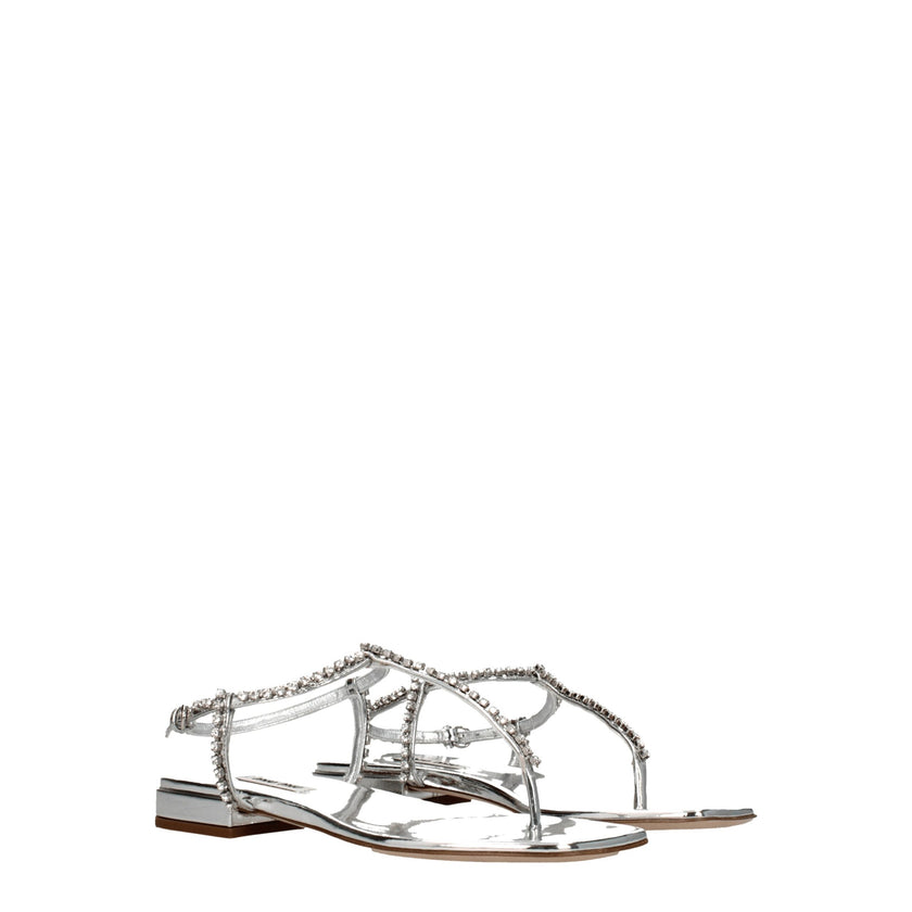 Gray Leather Flip-Flop SandalsDescription: The product with MPN 5Y920D3L1N010F0118 and code F76545 leather in silver is a flip flops designed by Miu Miu. It has features like metallic effect, rhinestone. Additional Info: Style: Stylish Closing type: Buckl