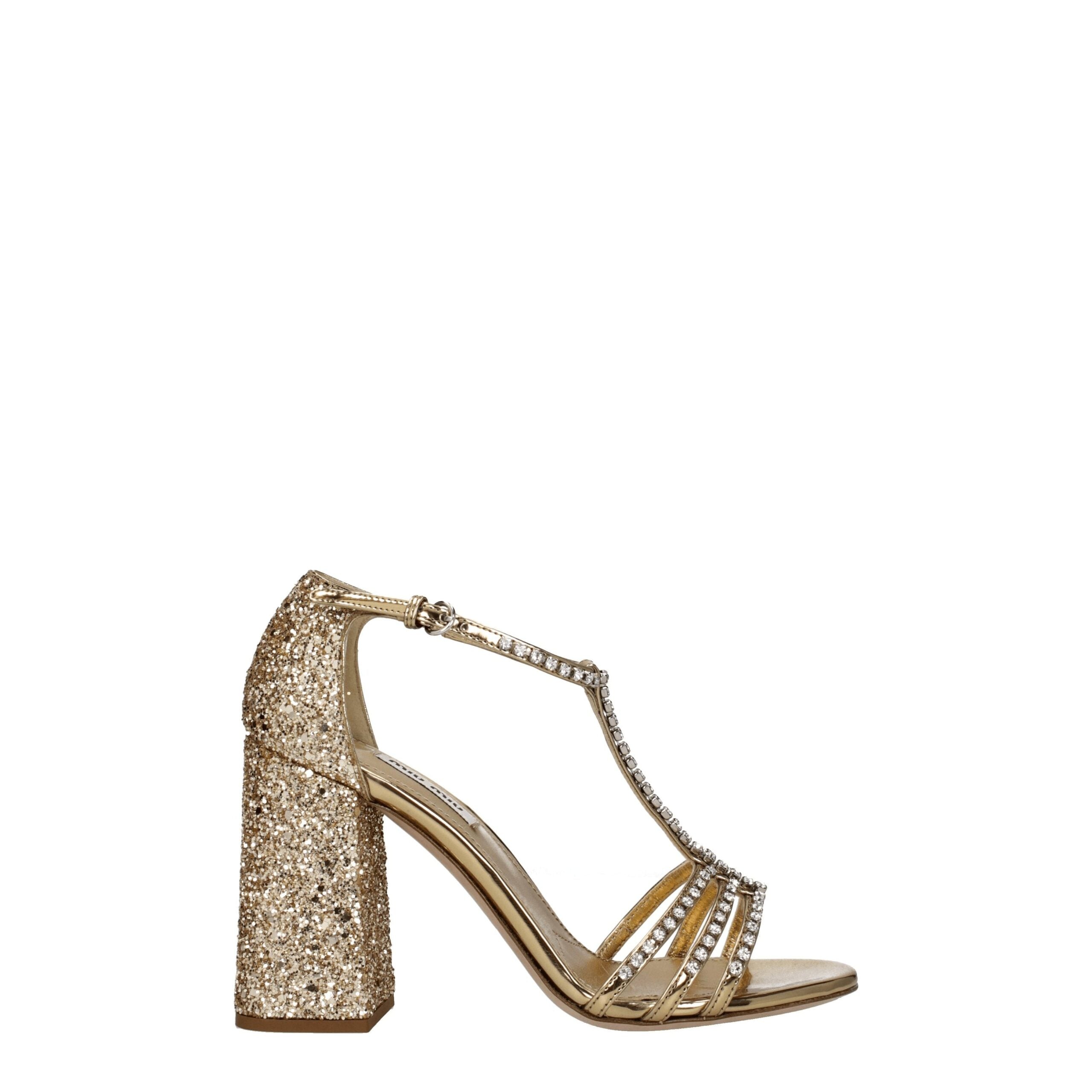 Gold Plastic Platform SandalsDescription: The product with MPN 5X732D3LKS100F0522 and code F76684 glitter in gold is a sandals designed by Miu Miu. It has features like rhinestone. Additional Info: Style: Stylish Closing type: Buckle Closure Materials: Le