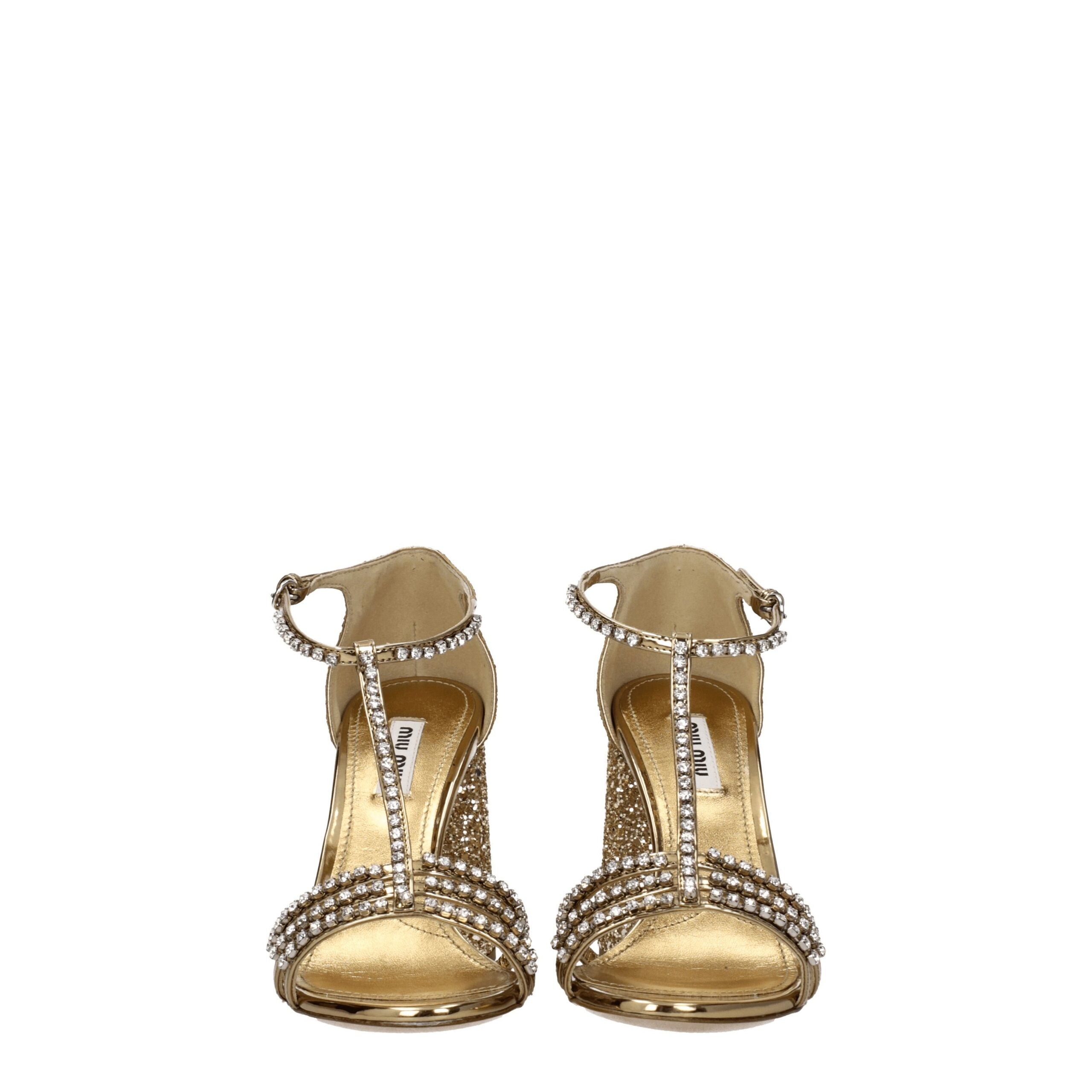 Gold Plastic Platform SandalsDescription: The product with MPN 5X732D3LKS100F0522 and code F76684 glitter in gold is a sandals designed by Miu Miu. It has features like rhinestone. Additional Info: Style: Stylish Closing type: Buckle Closure Materials: Le